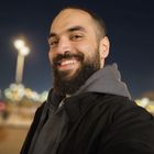 Karim Shalapy in open air mall at night